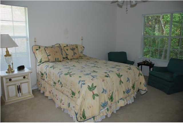 3900 Mesa Road Destin, FL 32541 - Photo 8 of 12 a black and white photo of a bedroom