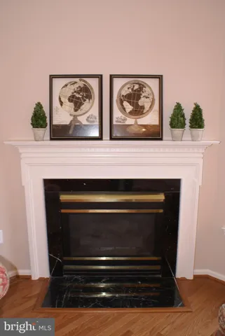 a fireplace with a vase on top of it