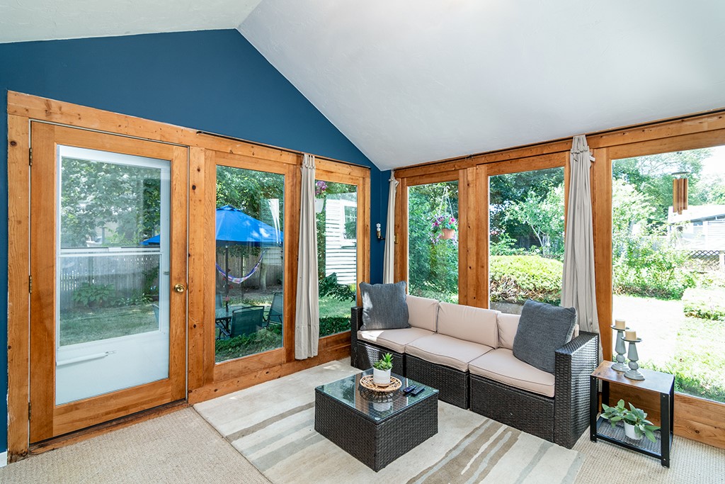 69 Delwood Road Warwick, RI 02889 - Photo 11 of 31 floor to ceiling insulated glass windows overlooking private fenced rear yard