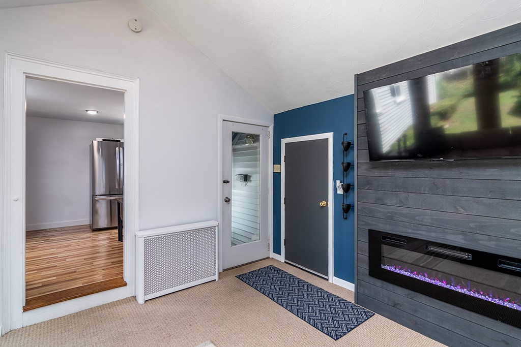 69 Delwood Road Warwick, RI 02889 - Photo 15 of 31 from family room this is the enrty to the kitchen a side entru to the drive and the door to the attached garage