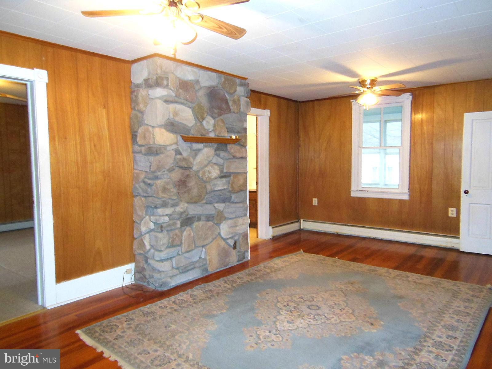 1330 Stone Road Westminster, MD 21158 - Photo 18 of 30 Living Room chimney stone surround installed 2002