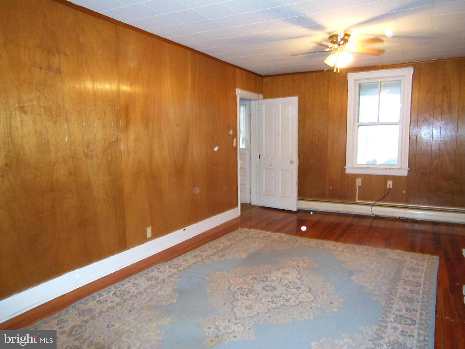 1330 Stone Road Westminster, MD 21158 - Photo 19 of 30 Beautiful hardwood floors in LR are original