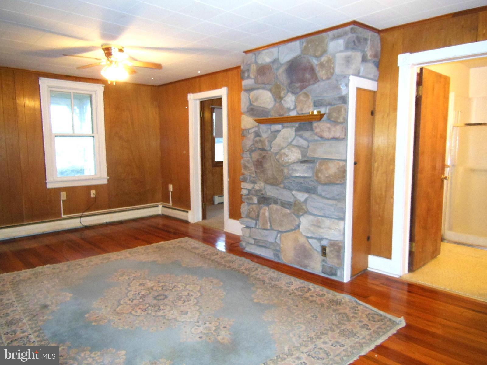 1330 Stone Road Westminster, MD 21158 - Photo 20 of 30 Living Room - stone surround has a built-in closet