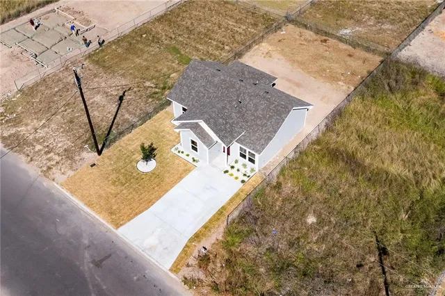 a front view of a house with a garage