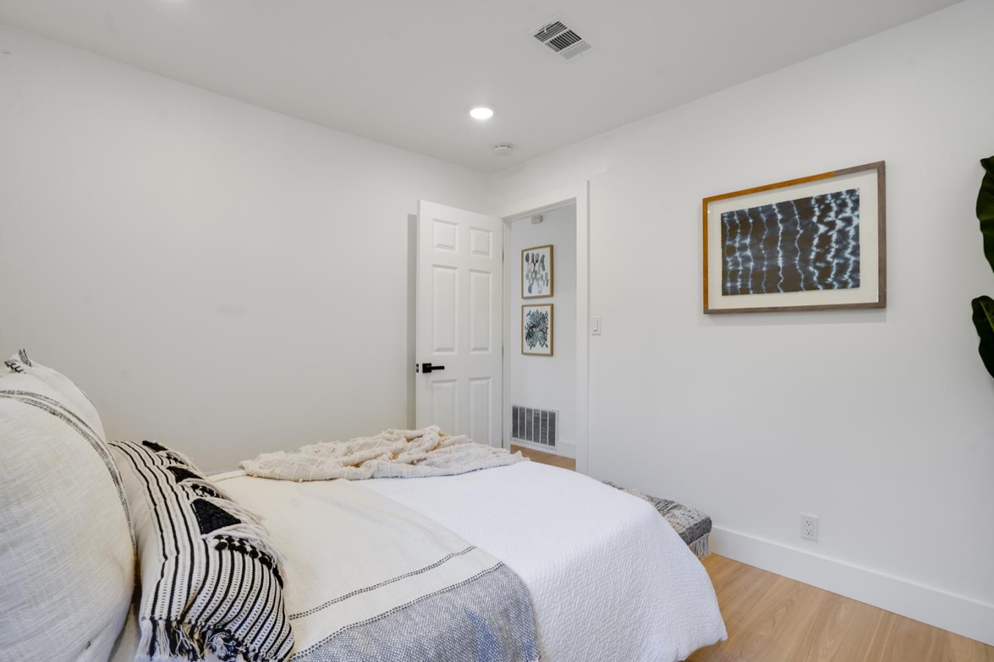 3649 Rowley Drive San Jose, CA 95132 - Photo 18 of 49 a bedroom with a bed and a table