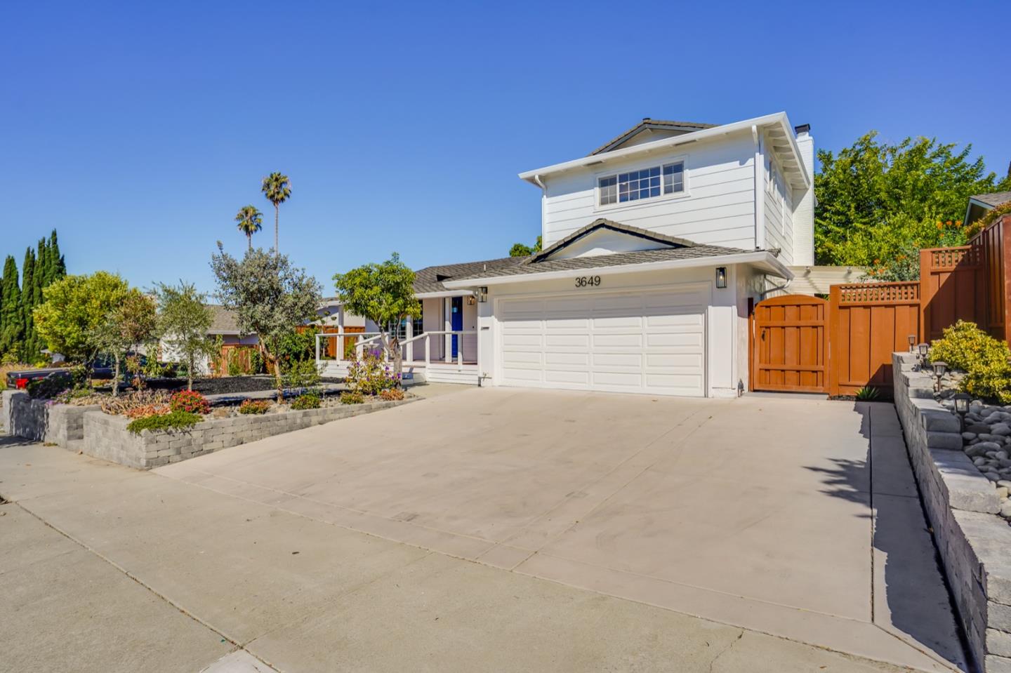 3649 Rowley Drive San Jose, CA 95132 - Photo 2 of 49 a view of a house with backyard and sitting area