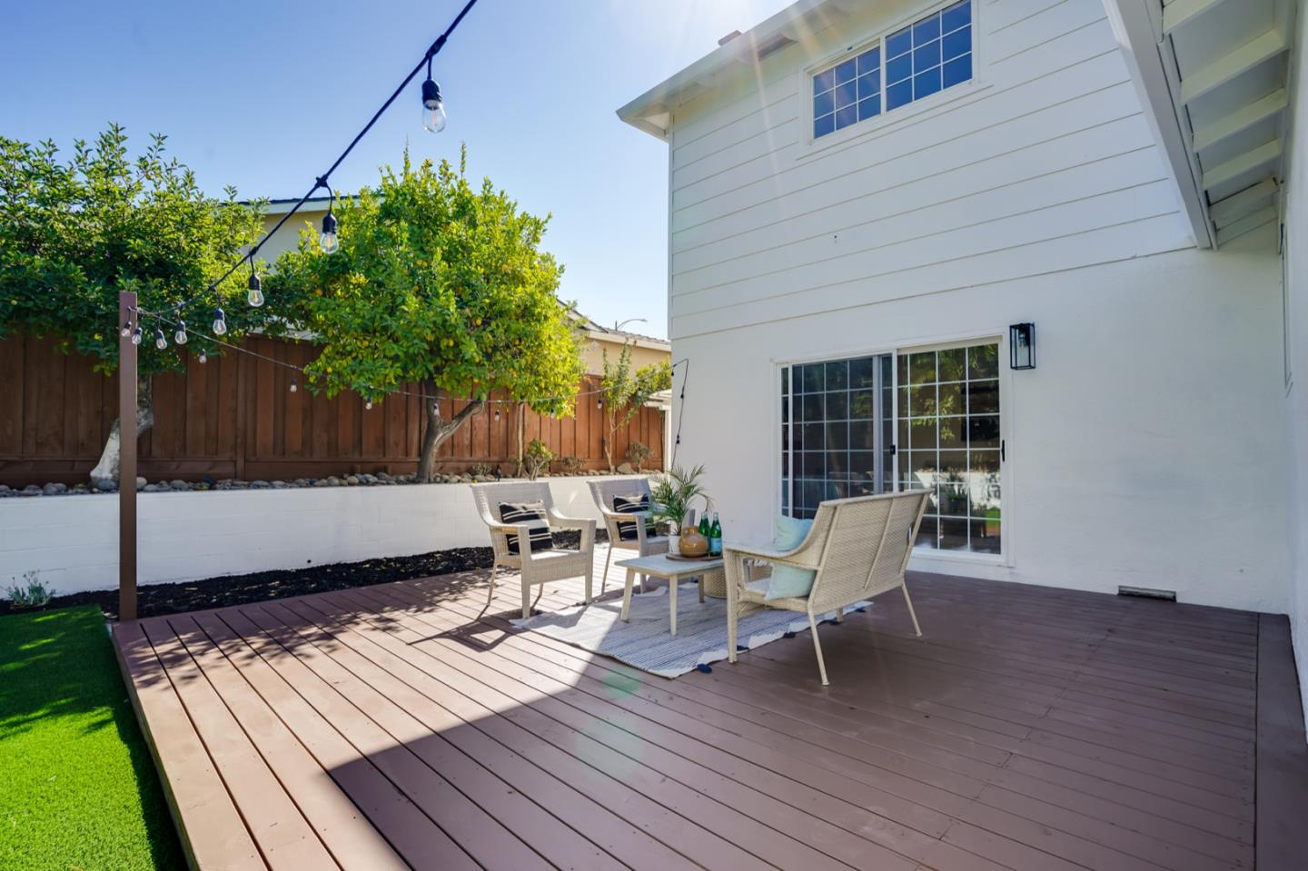 3649 Rowley Drive San Jose, CA 95132 - Photo 34 of 49 a wooden bench sitting in front of a house
