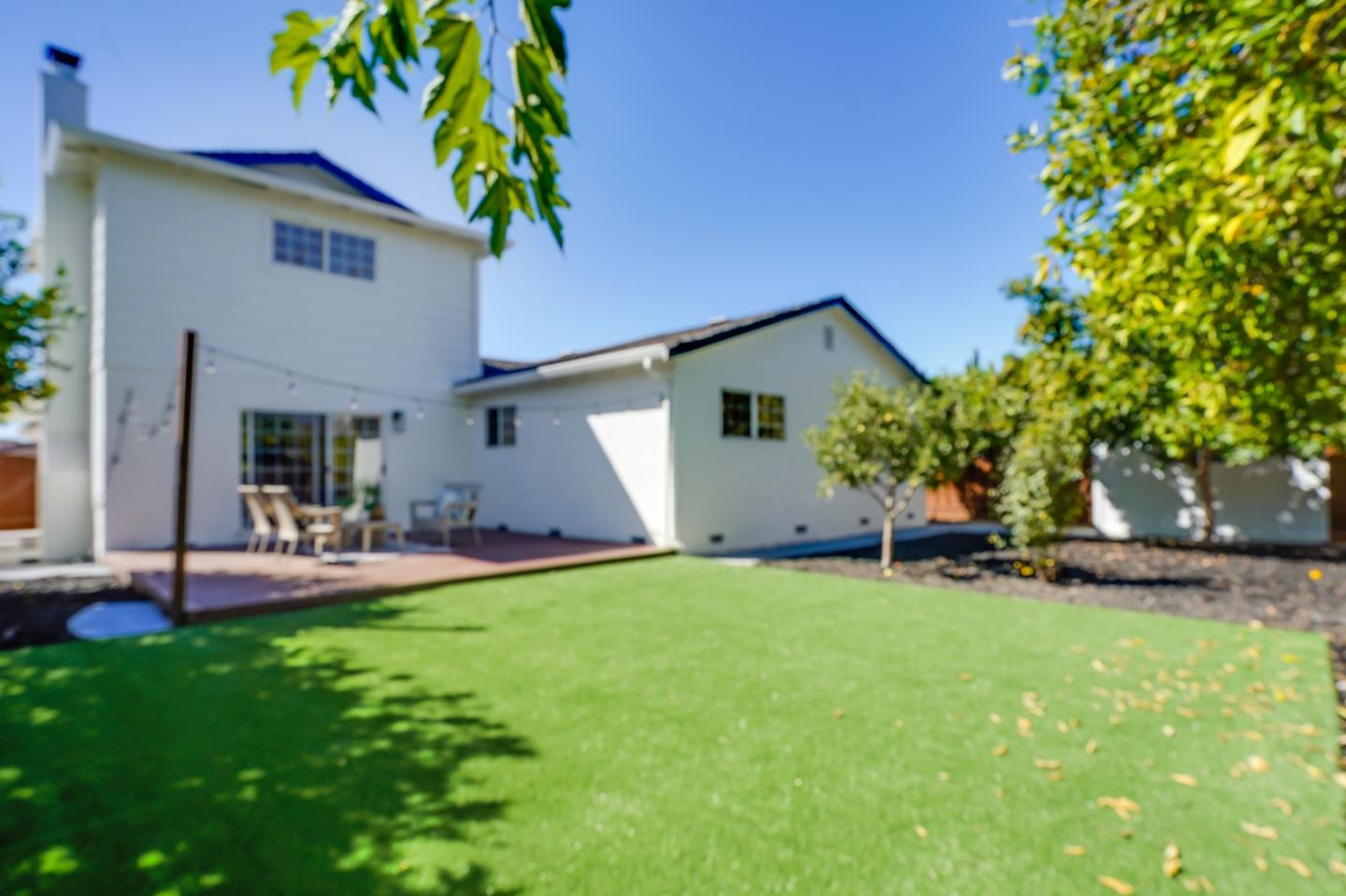 3649 Rowley Drive San Jose, CA 95132 - Photo 36 of 49 a view of a house with a yard and sitting area