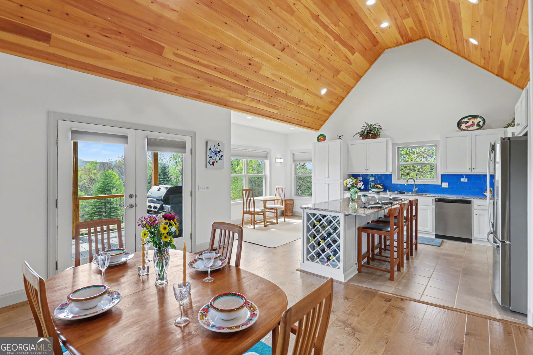 100 Deacons Way Franklin, NC 28734 - Photo 18 of 53 a dining room with furniture window and wooden floor