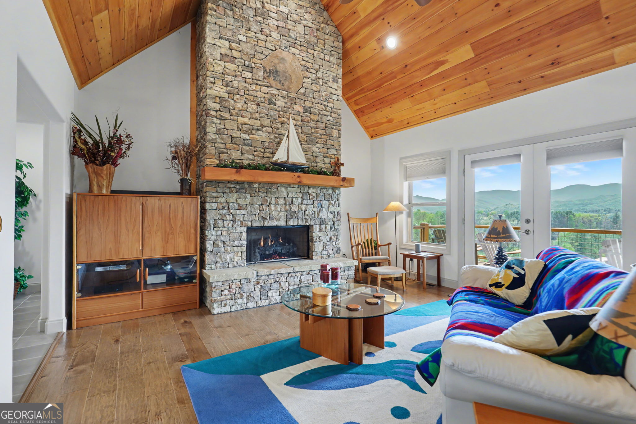 100 Deacons Way Franklin, NC 28734 - Photo 20 of 53 a living room with furniture and a fireplace