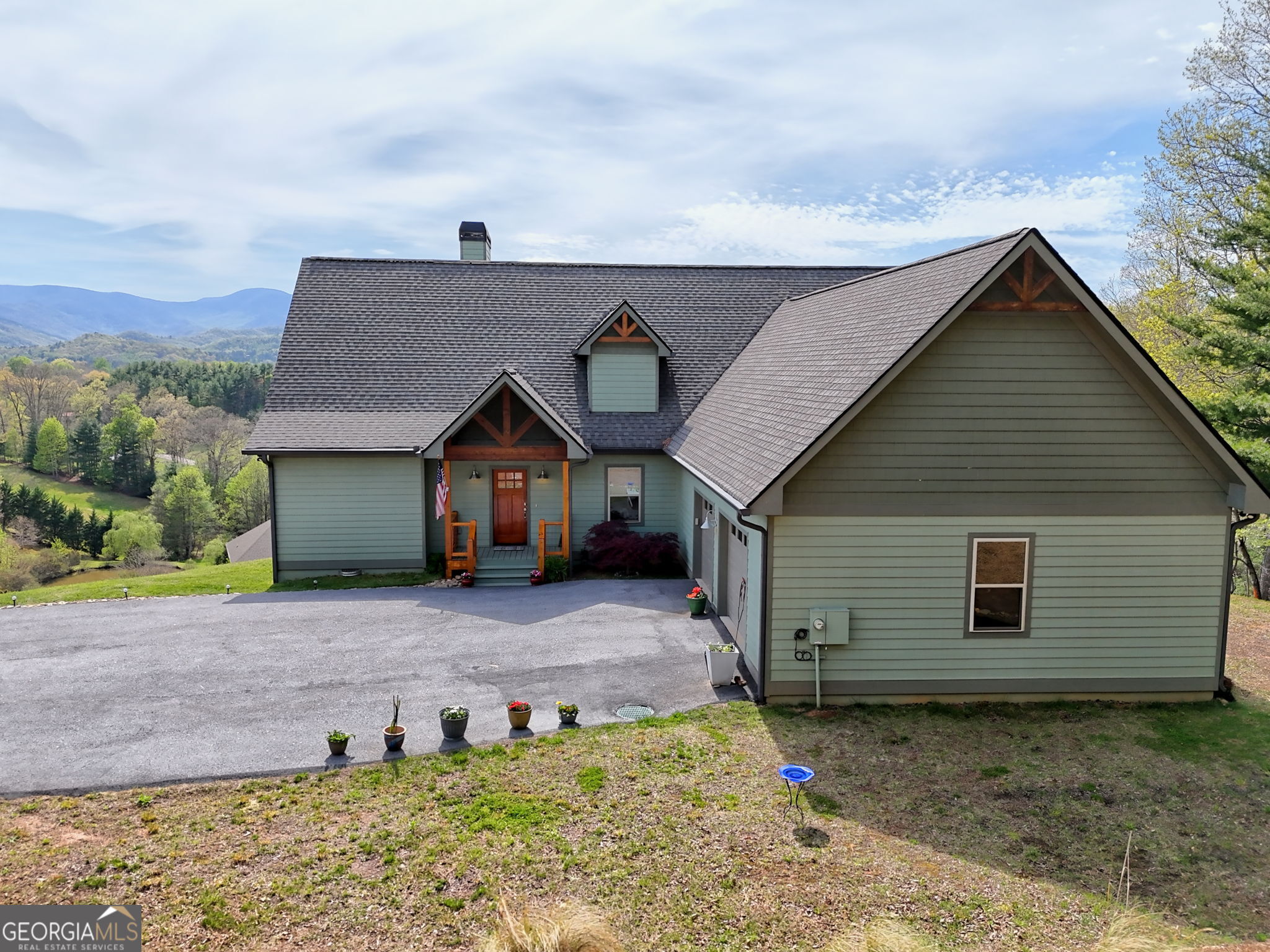 100 Deacons Way Franklin, NC 28734 - Photo 2 of 53 a view of a small house in front of a yard