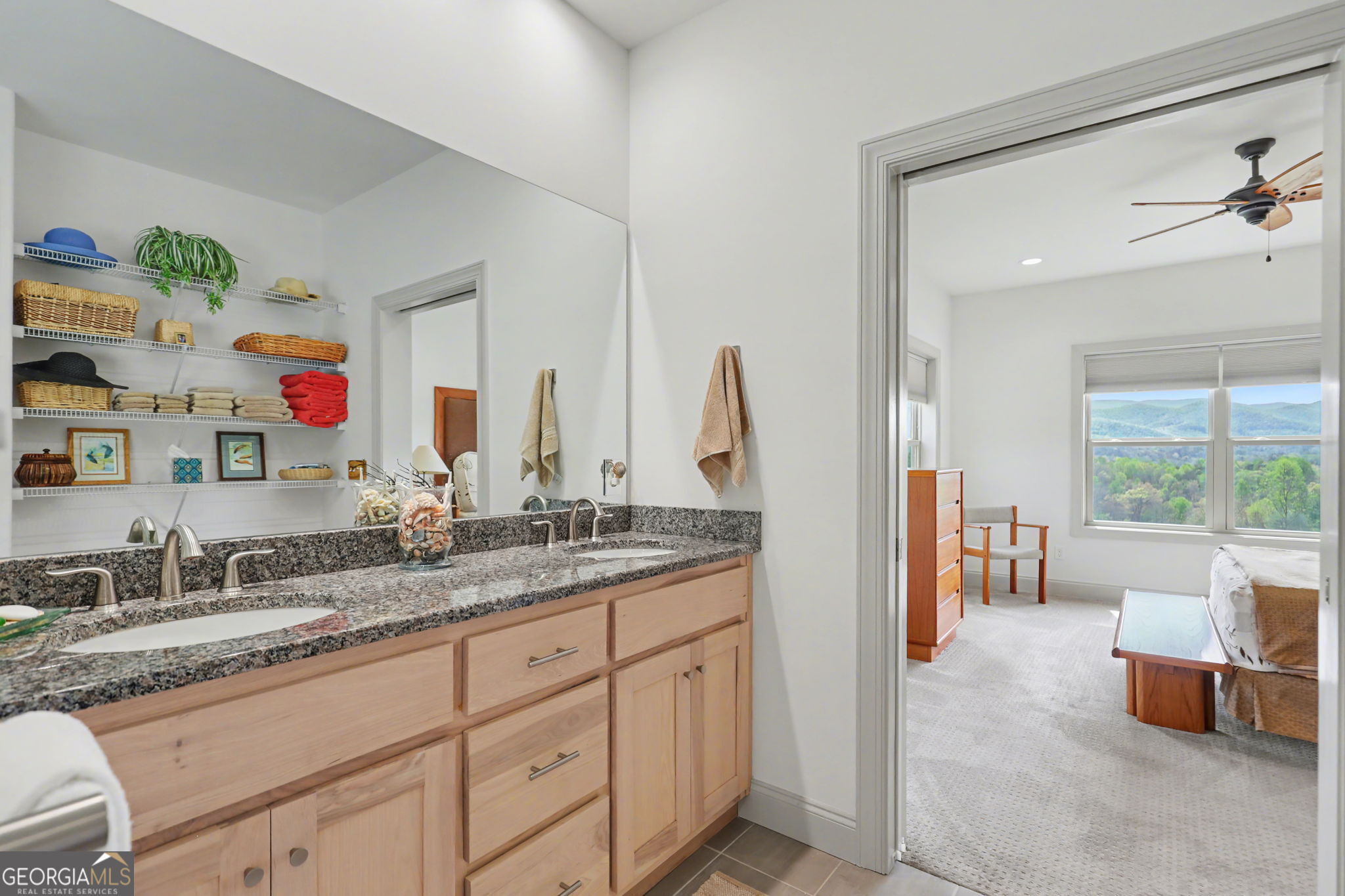 100 Deacons Way Franklin, NC 28734 - Photo 27 of 53 a en suite bathroom with a granite countertop double vanity sink and a large mirror