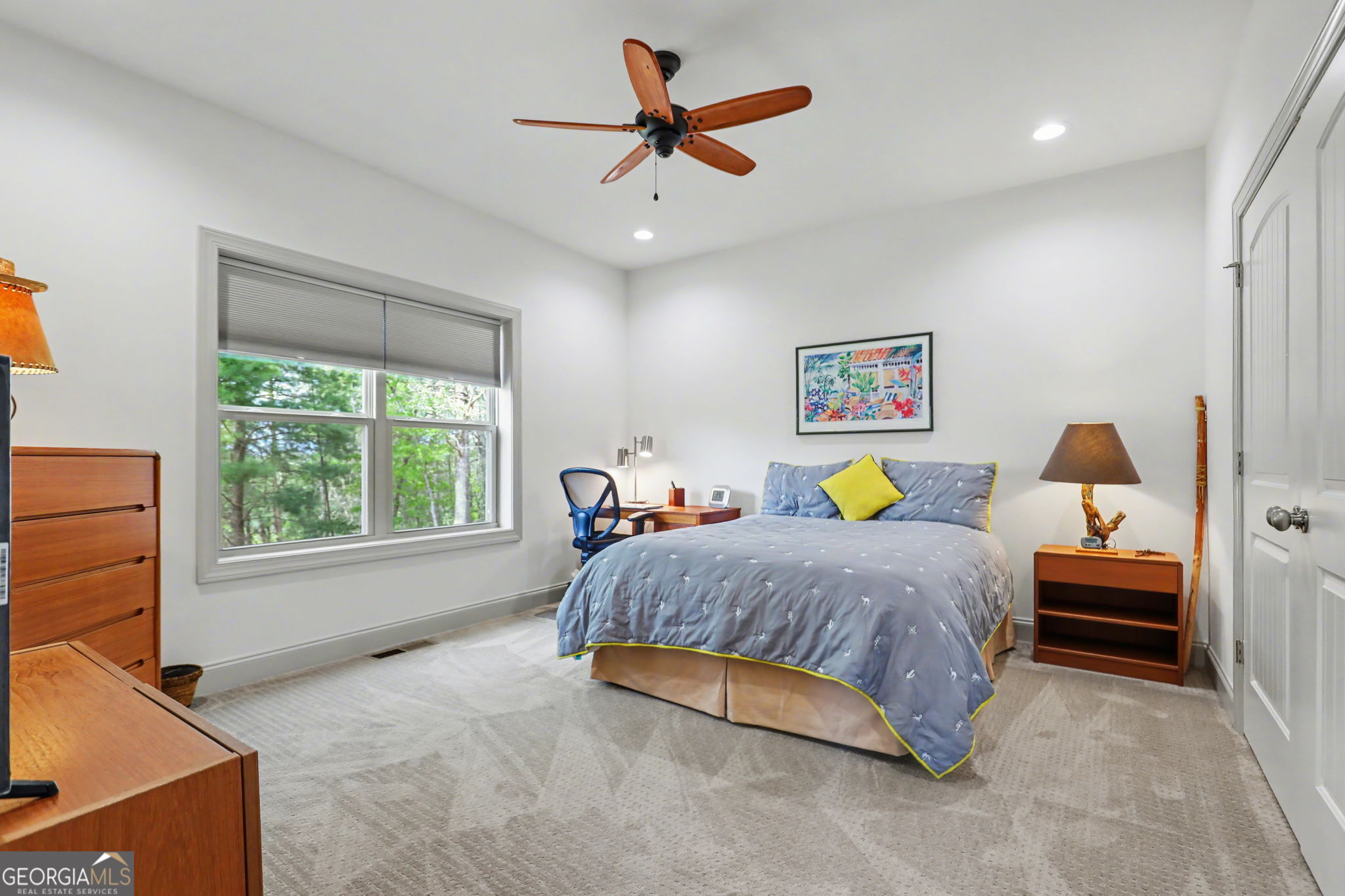 100 Deacons Way Franklin, NC 28734 - Photo 29 of 53 a bedroom with a bed and a chandelier