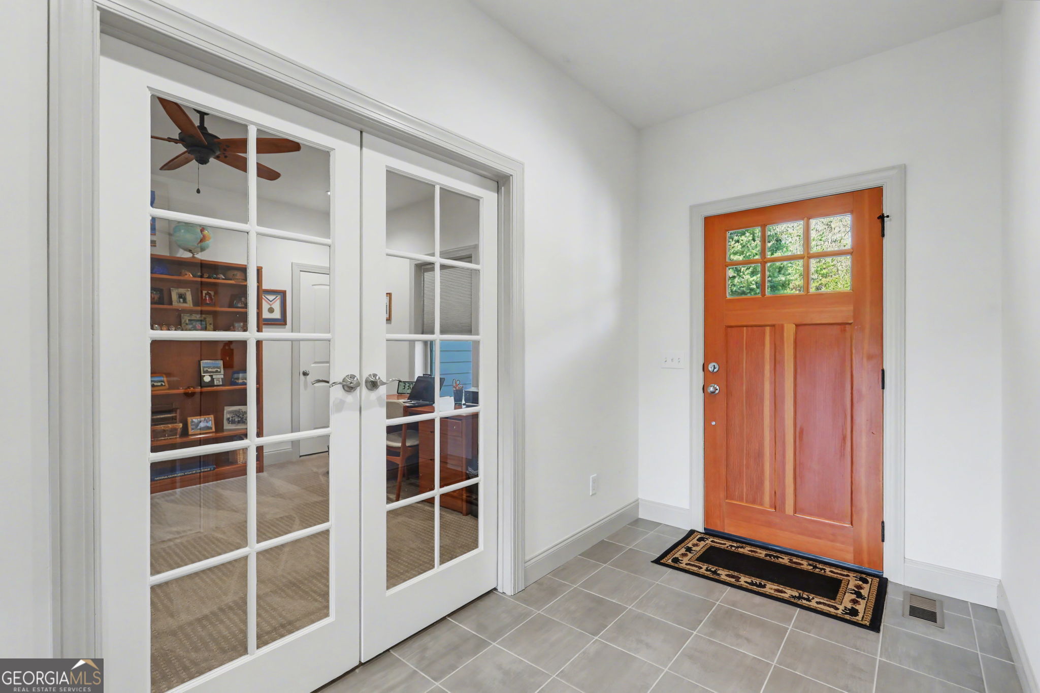 100 Deacons Way Franklin, NC 28734 - Photo 35 of 53 a view of an empty room with wooden floor and a window