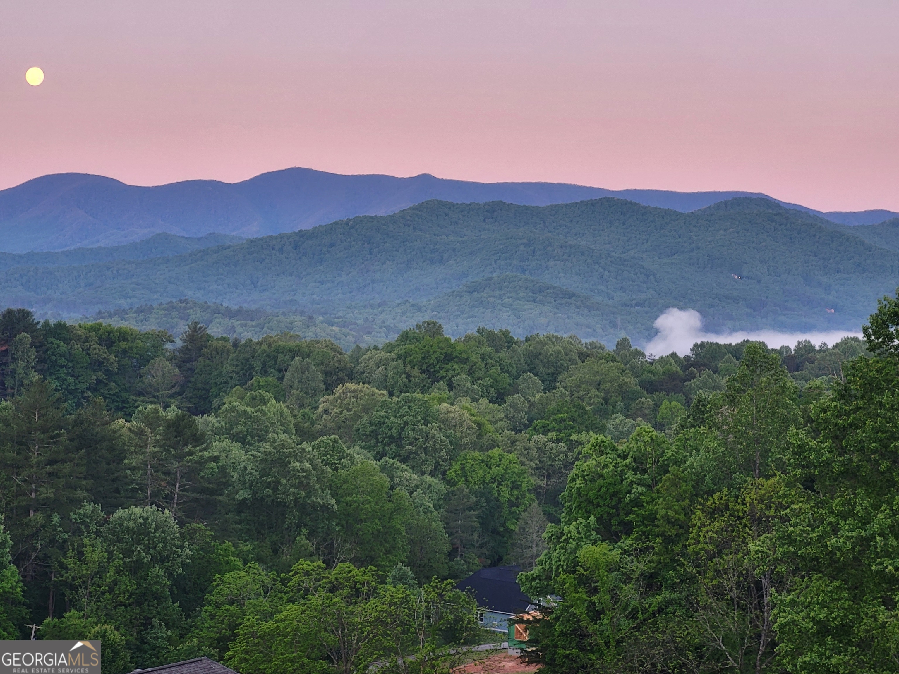 100 Deacons Way Franklin, NC 28734 - Photo 44 of 53 a view of a town with mountains in the background