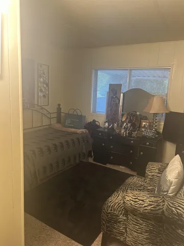 a view of a door and a window