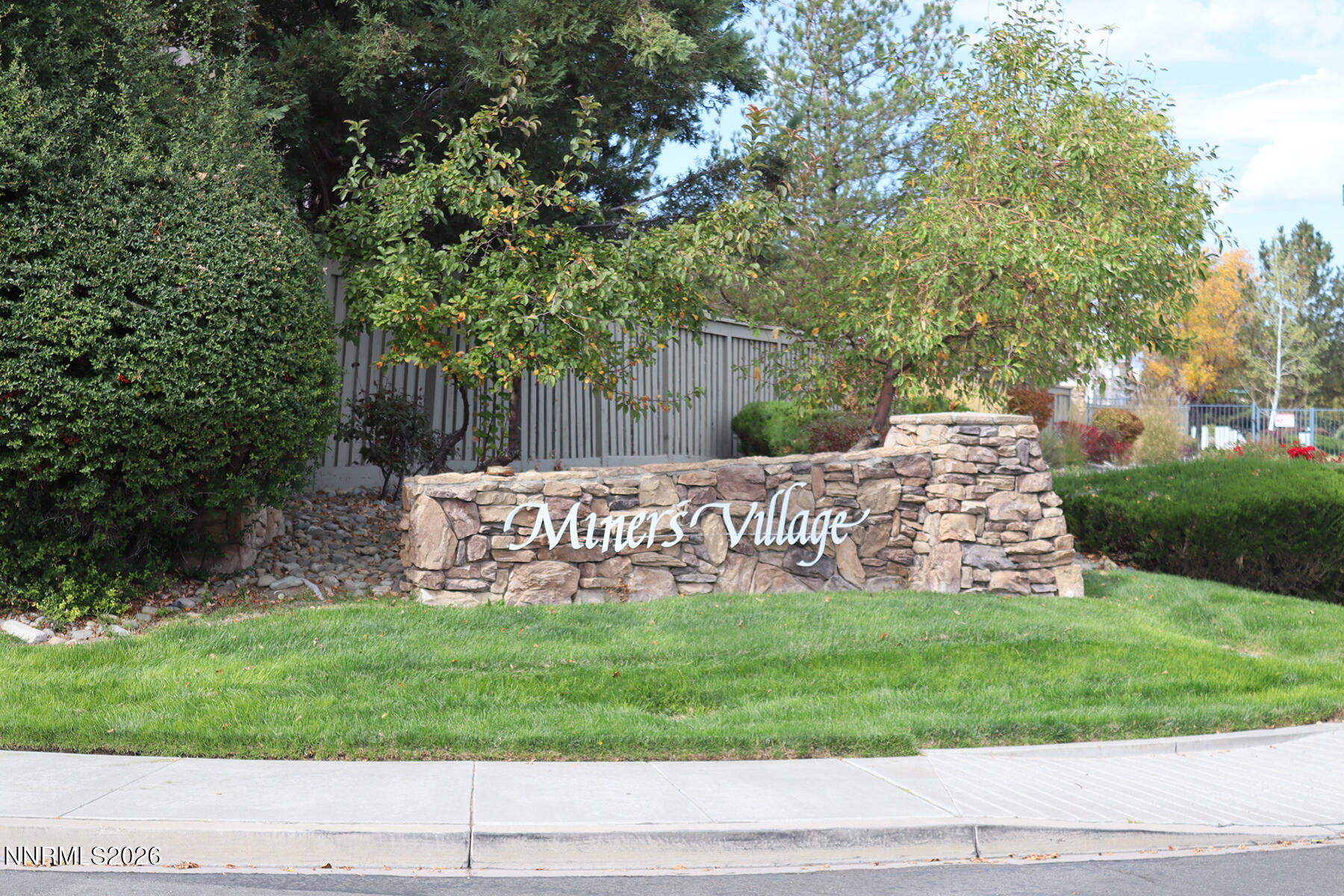 1441 Wild Wolf Way Reno, NV 89521 - Photo 3 of 59 Miners Village Entry Sign