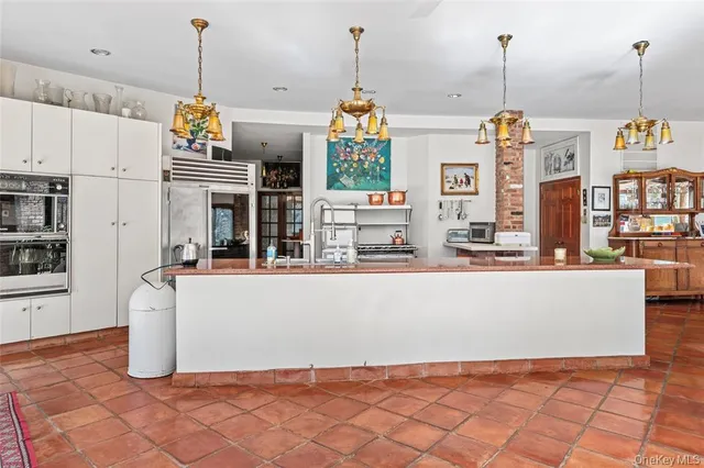 a view of kitchen and living room with furniture