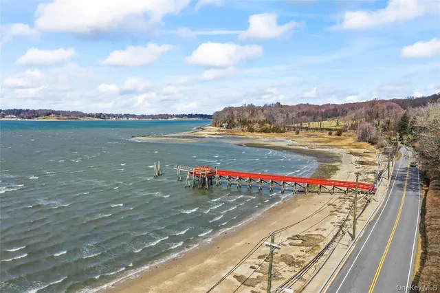a view of an ocean with a nearby beach