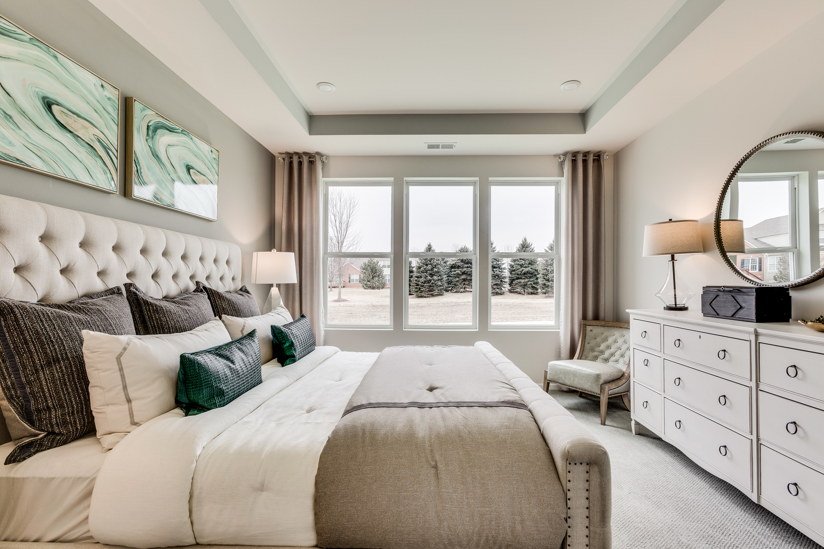 825 Spring Drive Lindenhurst, IL 60046 - Photo 18 of 29 a large bed sitting in a bedroom next to a window