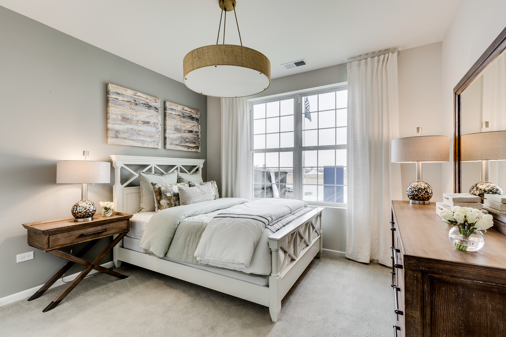 825 Spring Drive Lindenhurst, IL 60046 - Photo 21 of 29 a bedroom with a bed and a window