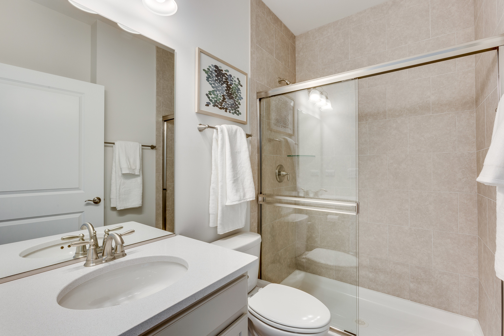 825 Spring Drive Lindenhurst, IL 60046 - Photo 23 of 29 a bathroom with a sink toilet and shower