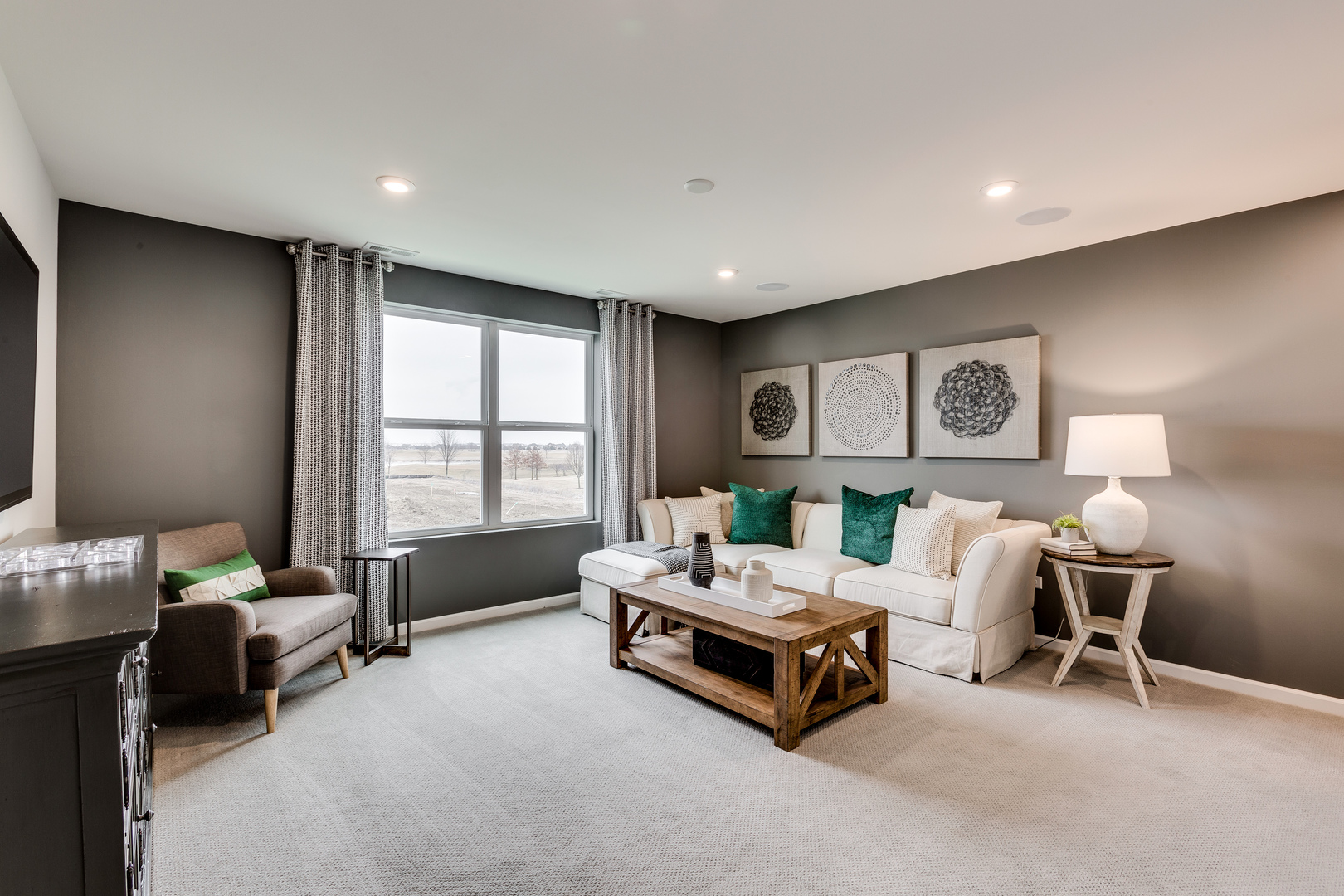 825 Spring Drive Lindenhurst, IL 60046 - Photo 25 of 29 a living room with furniture and a window