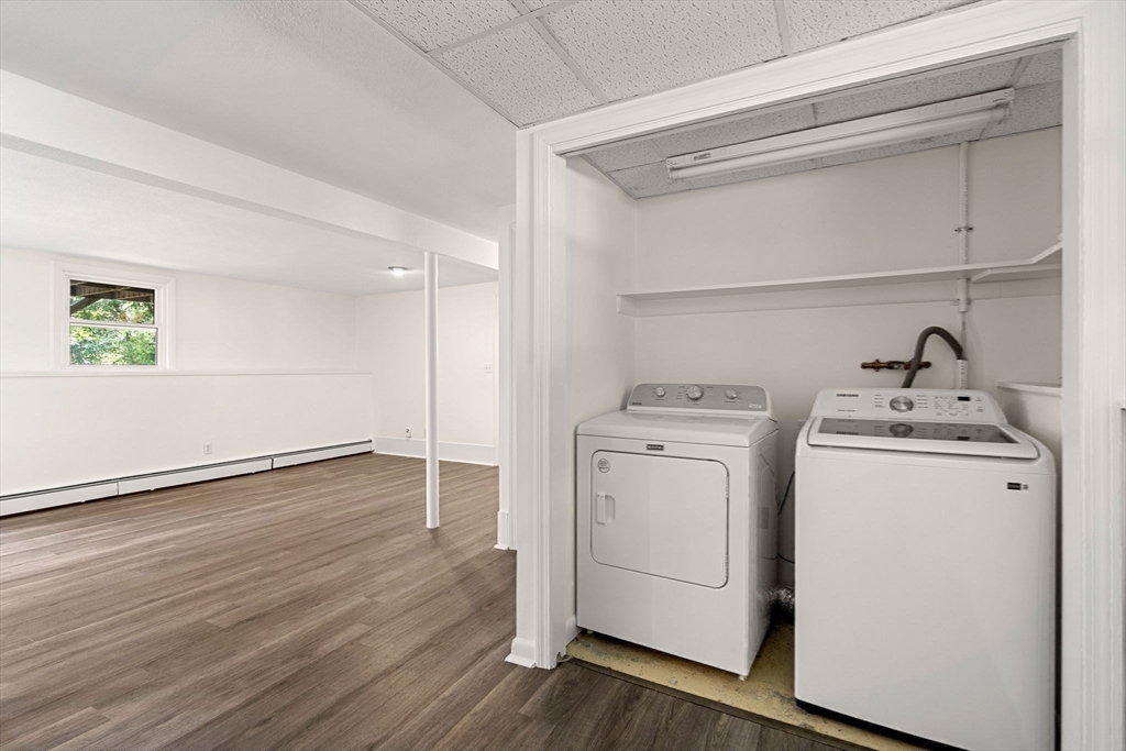 2 Mark Street Manchester, MA 01944 - Photo 25 of 33 a view of storage and utility room with washer and dryer