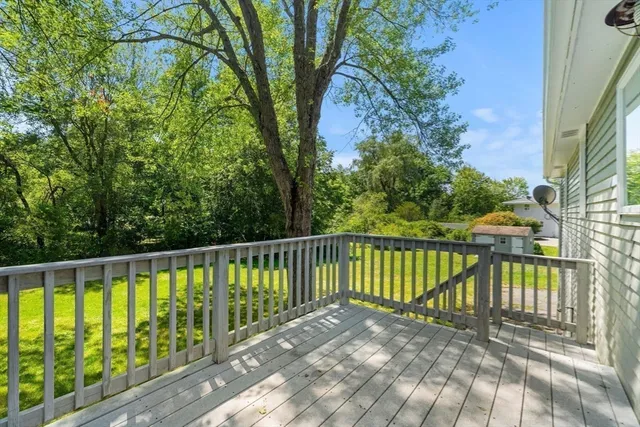 a view of a wooden street from a balcony