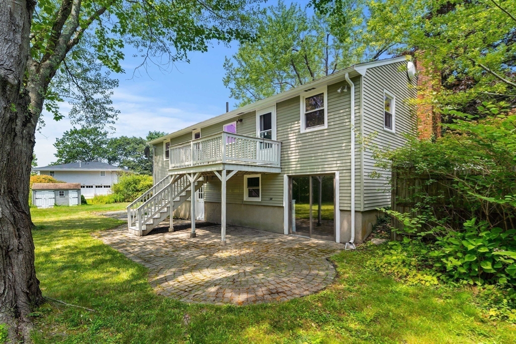 2 Mark Street Manchester, MA 01944 - Photo 30 of 33 a view of a house with backyard and garden