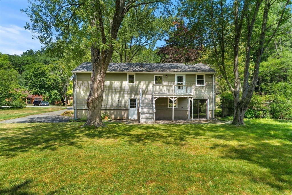 2 Mark Street Manchester, MA 01944 - Photo 3 of 33 a view of a house with a yard