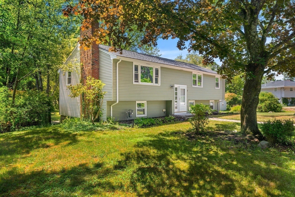 2 Mark Street Manchester, MA 01944 - Photo 4 of 33 a view of a house with a yard
