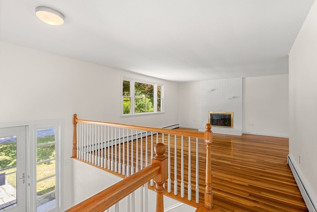 2 Mark Street Manchester, MA 01944 - Photo 6 of 33 a view of a bedroom with wooden floor and windows