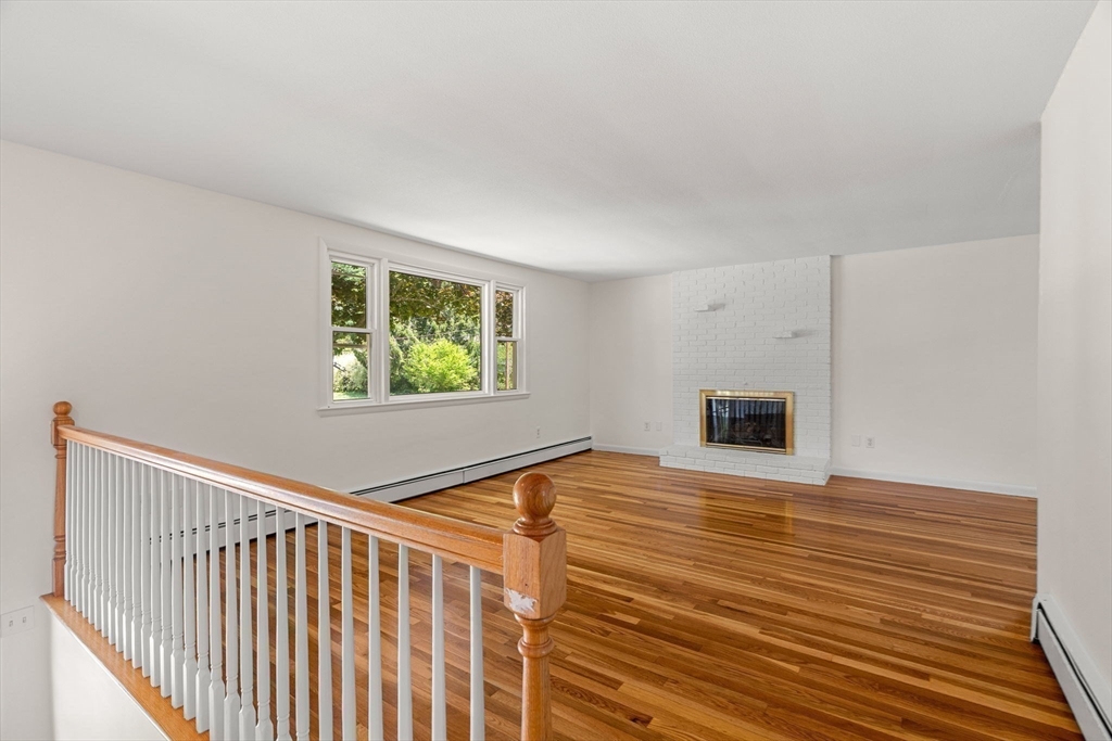 2 Mark Street Manchester, MA 01944 - Photo 7 of 33 a view of an empty room with window and wooden floor