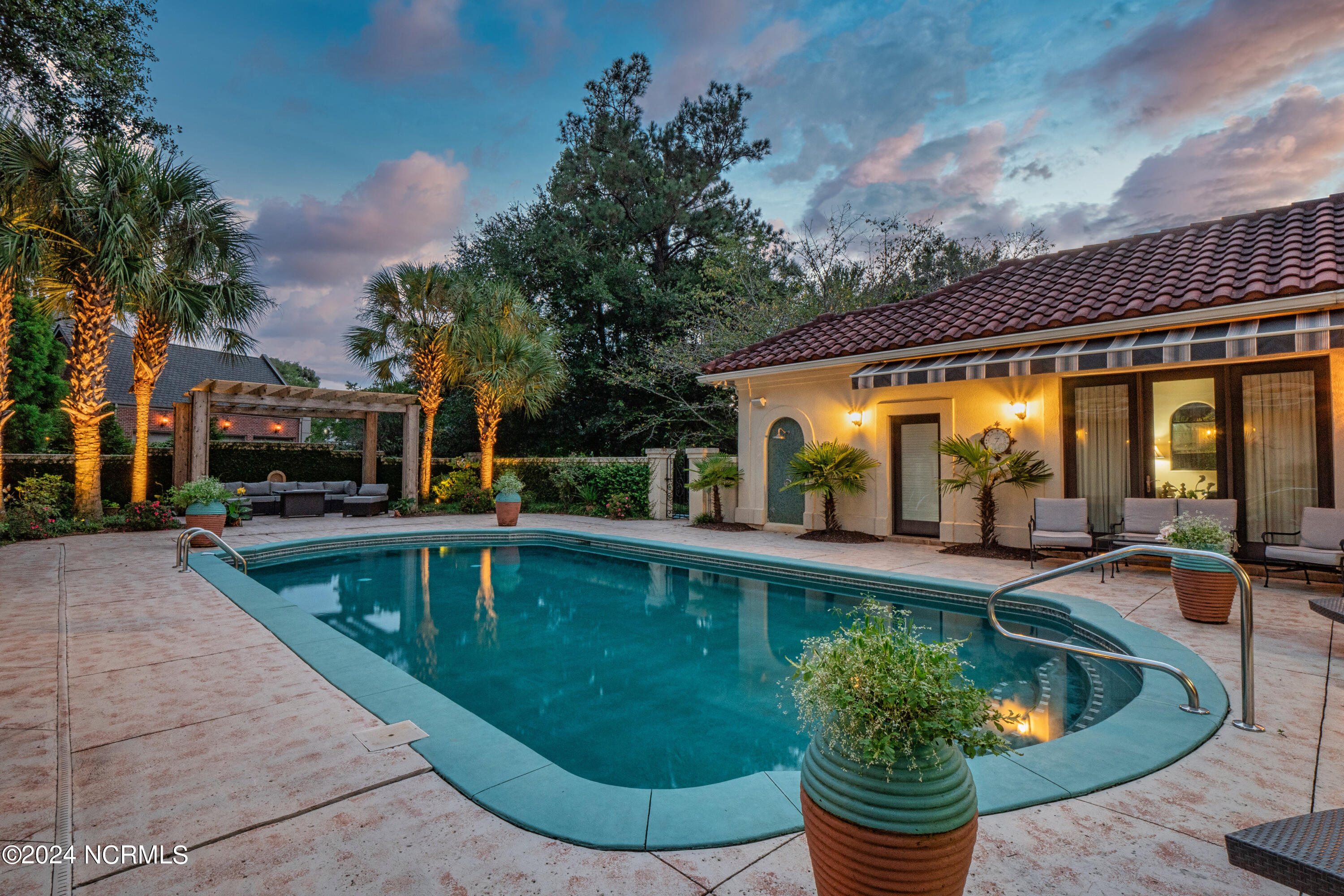 833 Gull Point Road Wilmington, NC 28405 - Photo 54 of 68 Refreshing saltwater pool in the evening