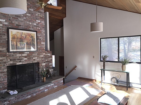 318 Stow Road Harvard, MA 01451 - Photo 12 of 16 a view of a livingroom with furniture and a fireplace