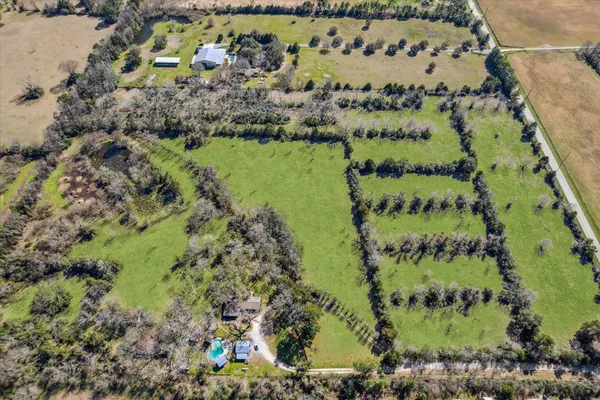 a view of a garden with a building