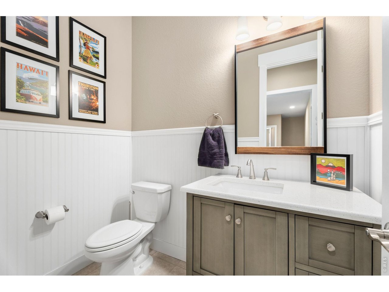 1030 Larimer Ridge Parkway Timnath, CO 80547 - Photo 20 of 38 a bathroom with a toilet a sink and mirror
