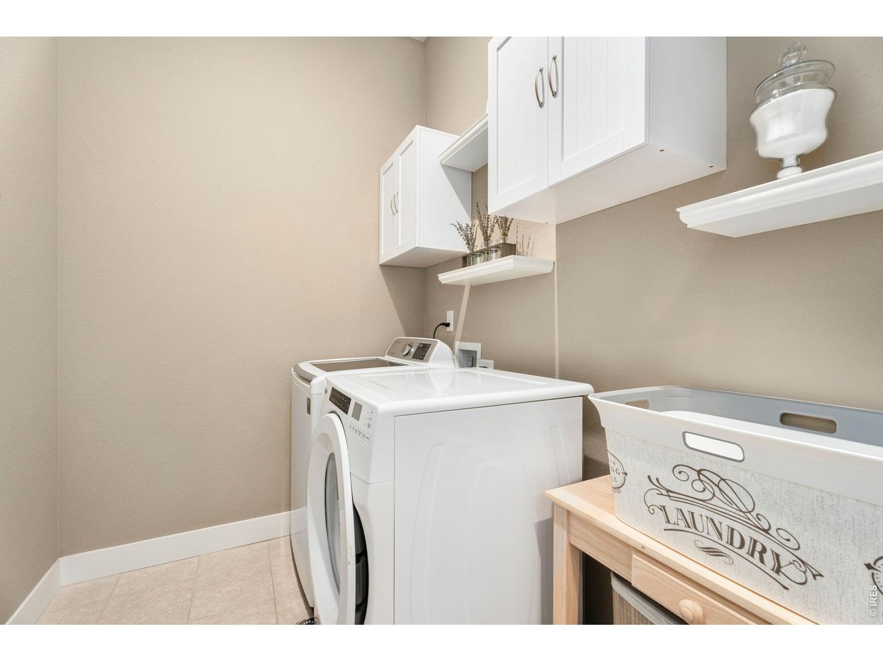 1030 Larimer Ridge Parkway Timnath, CO 80547 - Photo 21 of 38 a utility room with dryer and washer