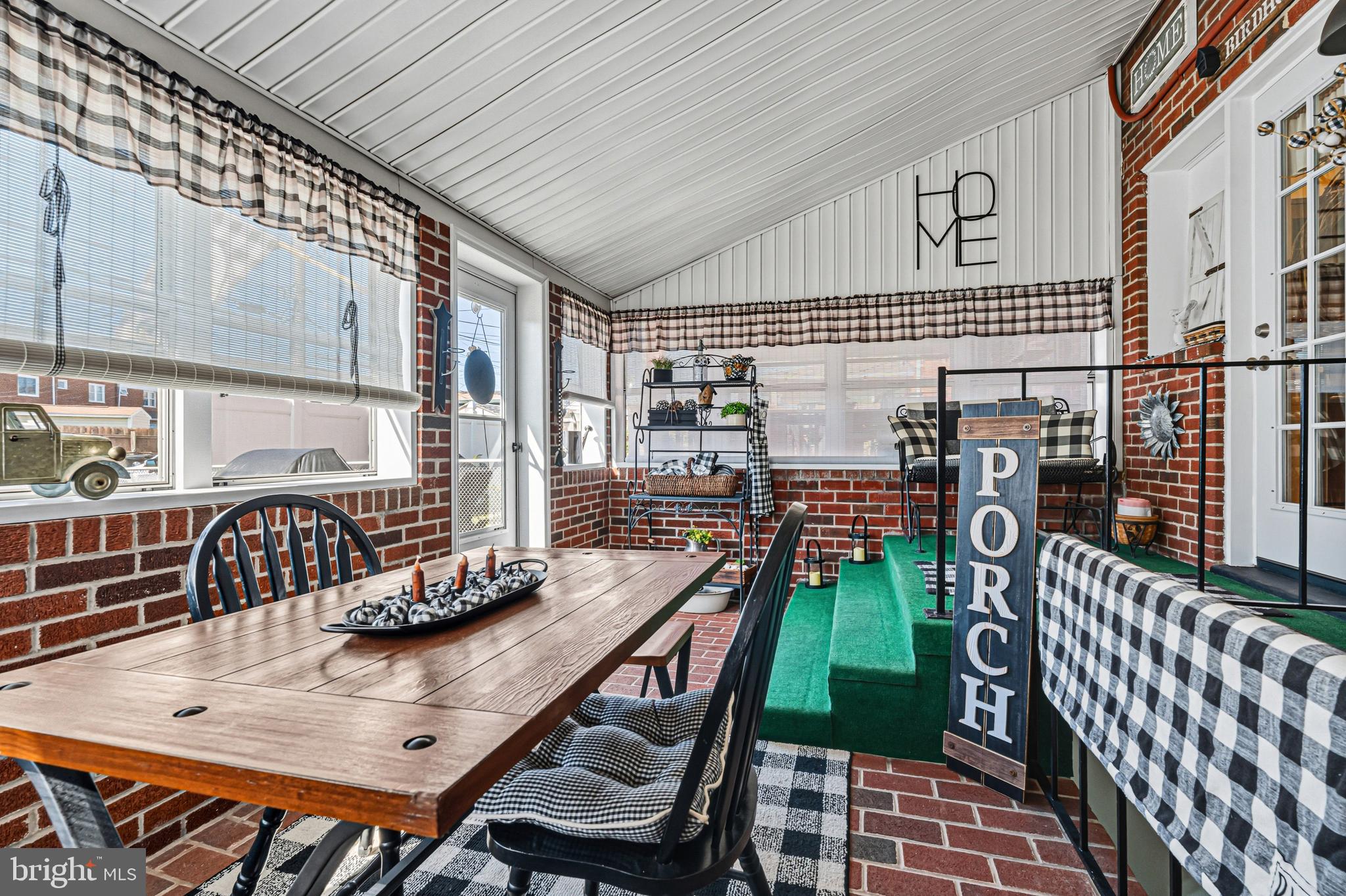 7815 Rockbourne Road Baltimore, MD 21222 - Photo 16 of 39 a view of a patio with chairs and table