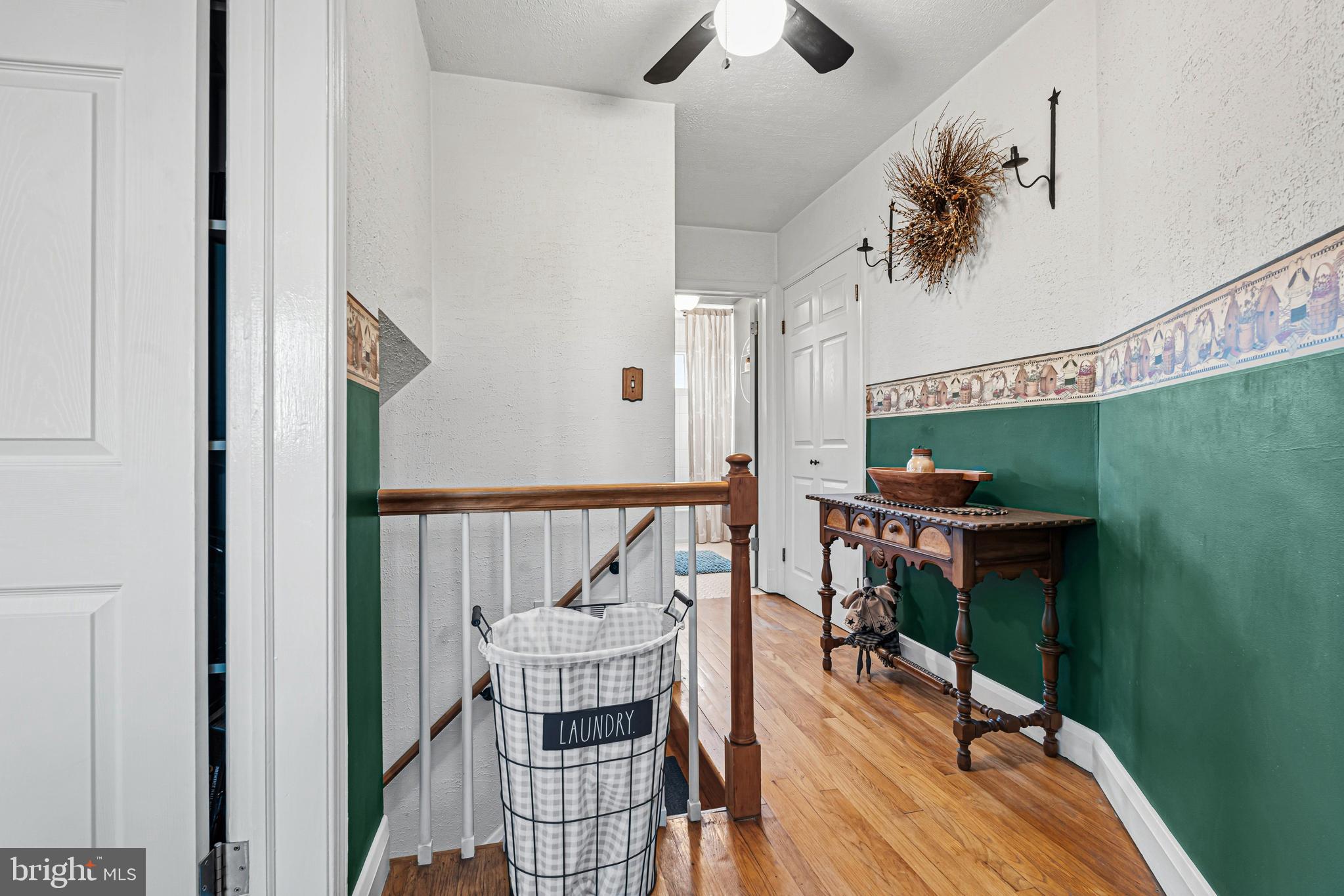7815 Rockbourne Road Baltimore, MD 21222 - Photo 19 of 39 a view of a dining room with furniture window and wooden floor