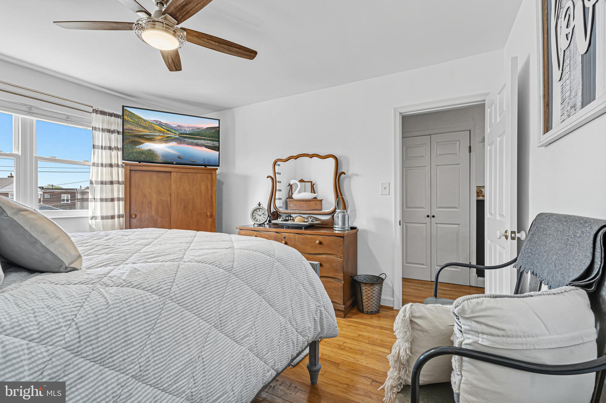 7815 Rockbourne Road Baltimore, MD 21222 - Photo 22 of 39 a bedroom with a bed and window