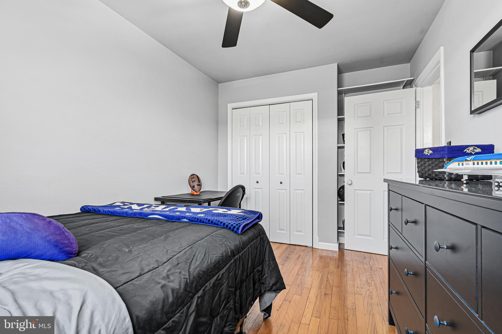 7815 Rockbourne Road Baltimore, MD 21222 - Photo 26 of 39 a bed room with a bed and a couch