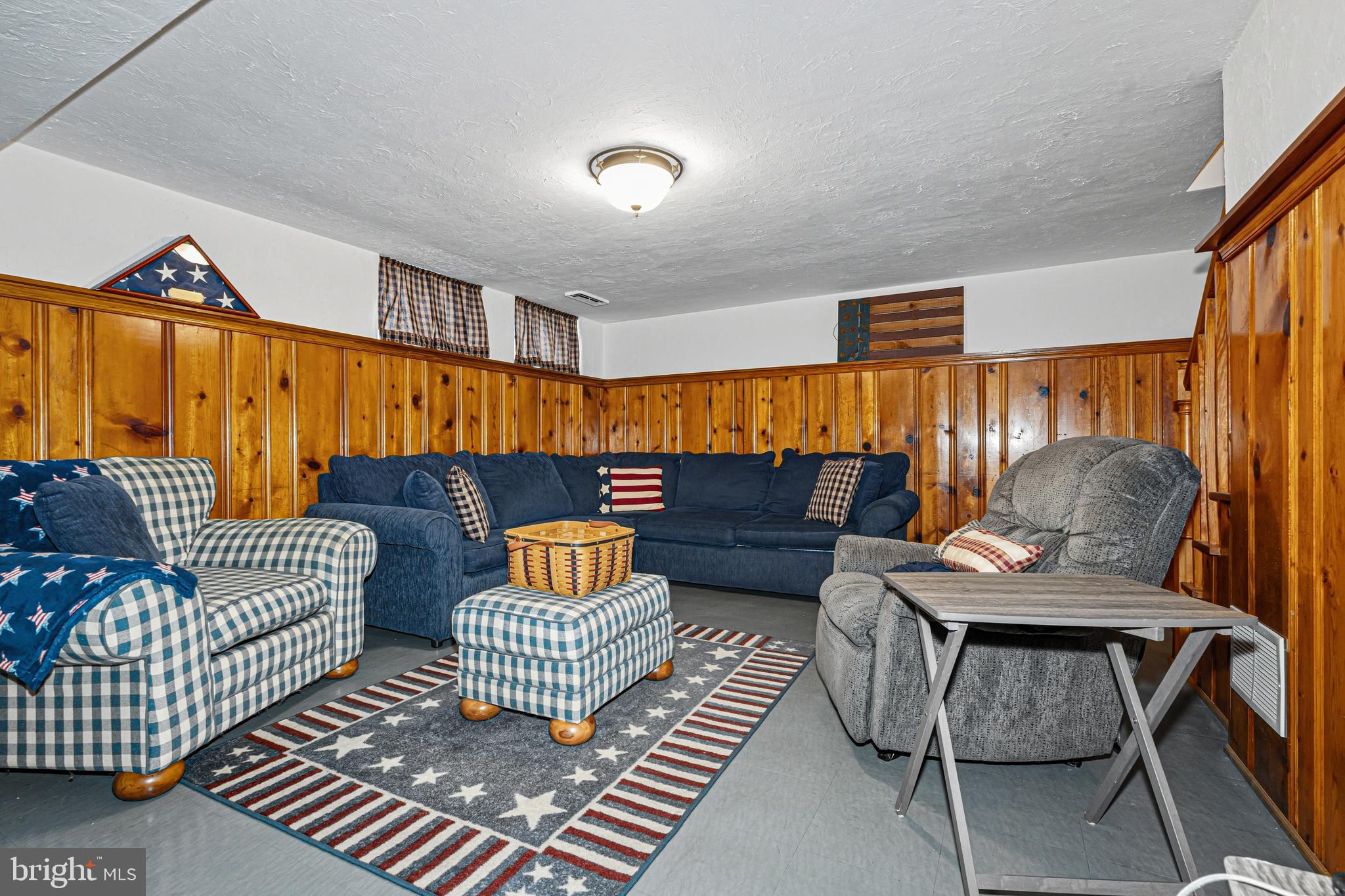 7815 Rockbourne Road Baltimore, MD 21222 - Photo 31 of 39 a living room with furniture and a couch