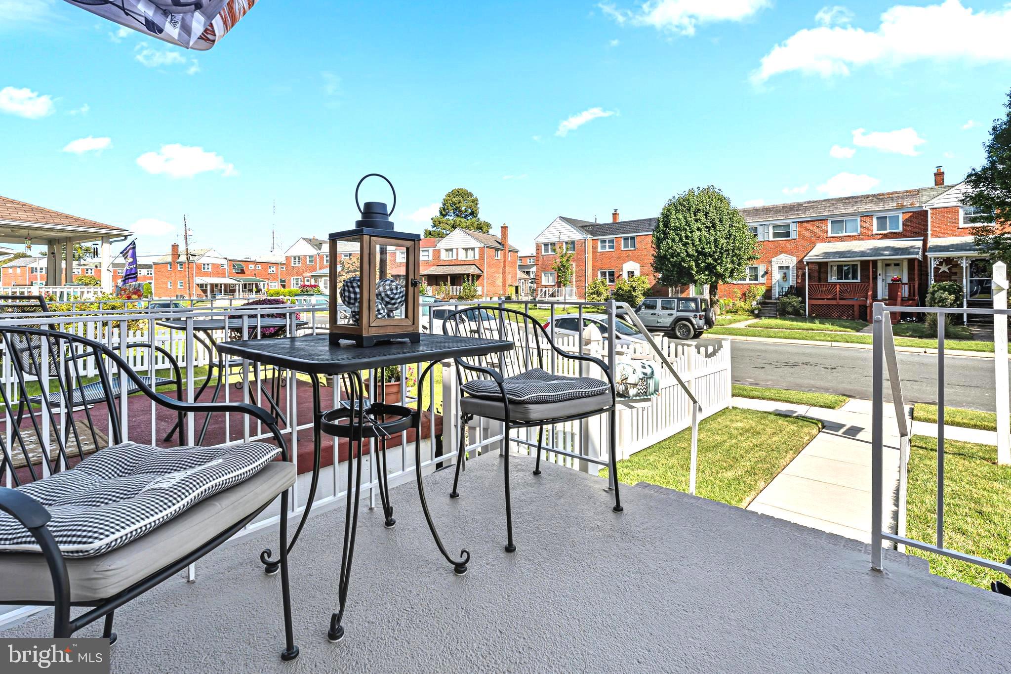 7815 Rockbourne Road Baltimore, MD 21222 - Photo 5 of 39 a view of a chairs and table in the patio