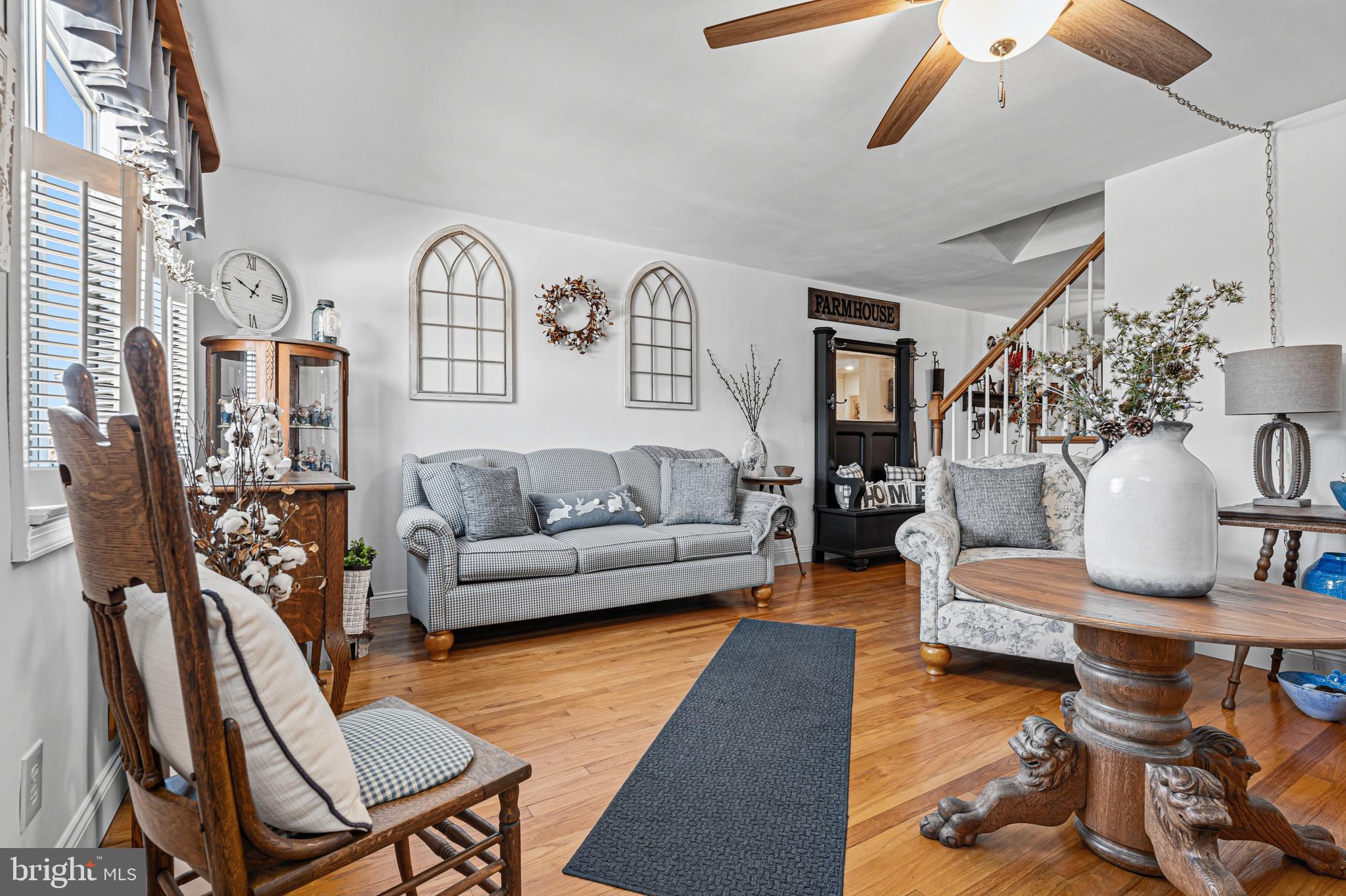 7815 Rockbourne Road Baltimore, MD 21222 - Photo 6 of 39 a living room with furniture and wooden floor