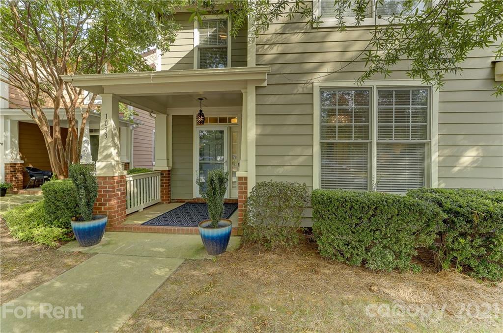 1033 Market Street Fort Mill, SC 29708 - Photo 2 of 46 a view of a house with potted plants