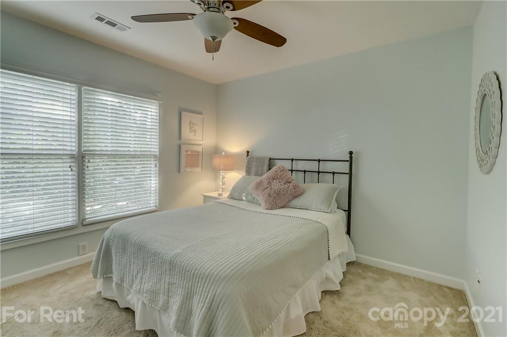 1033 Market Street Fort Mill, SC 29708 - Photo 30 of 46 a bedroom with a bed and window