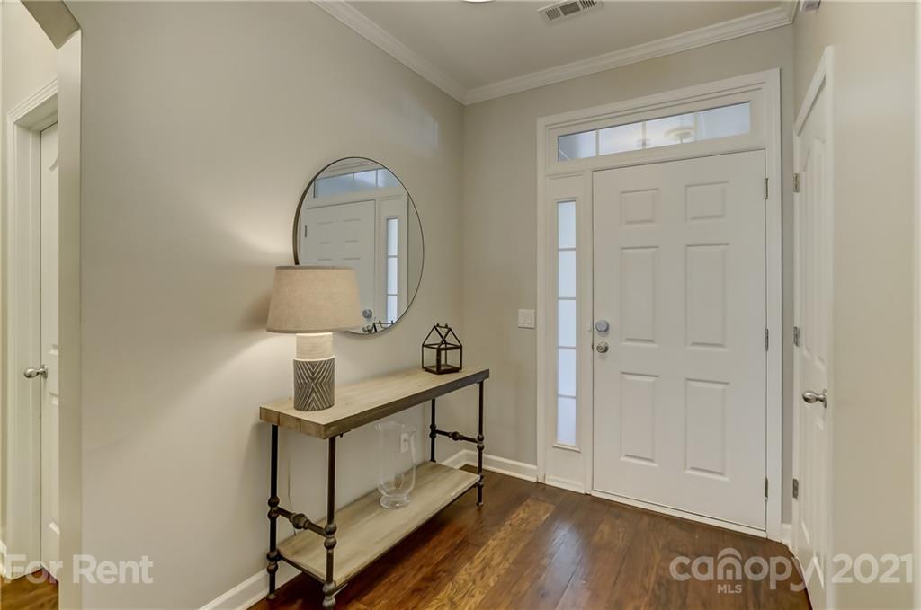 1033 Market Street Fort Mill, SC 29708 - Photo 4 of 46 a view of a room that has a bench in it