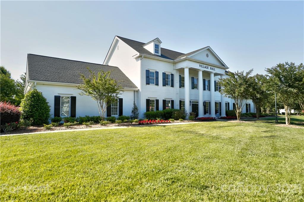 1033 Market Street Fort Mill, SC 29708 - Photo 38 of 46 a front view of a house with a garden